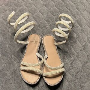 Elegant Cream Spiral Strap Sandals